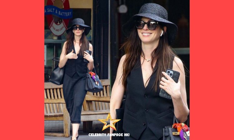 Anne Hathaway usa roupa toda preta enquanto faz tarefas em Nova York