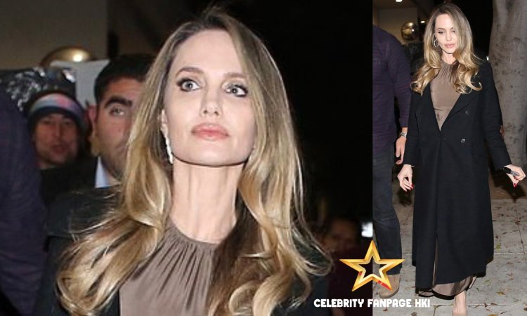 Angelina Jolie vira a cabeça em roupa elegante com seu cabelo loiro bombástico durante a noite em Beverly Hills