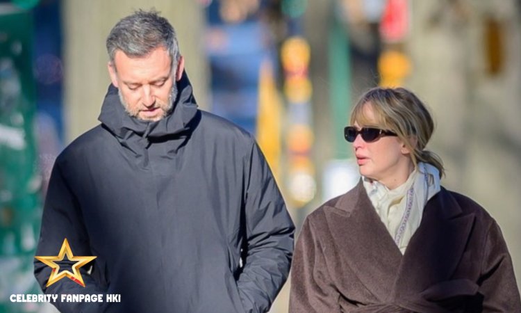 Grávida Jennifer Lawrence e marido Cooke Maroney se agasalham para caminhada em Nova York