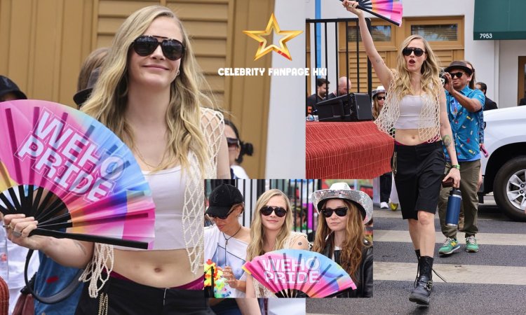 Cara Delevingne exibe seu abdômen incrível em um top curto enquanto festeja com amigos na Parada do Orgulho de WeHo